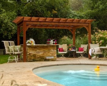 Traditional canyon brown stain wood pergola.