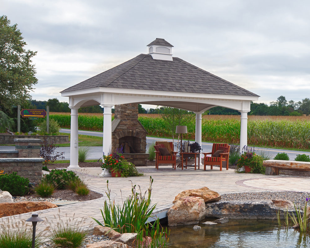 White vinyl Hampton pavilion with asphalt shingles and a cupola.