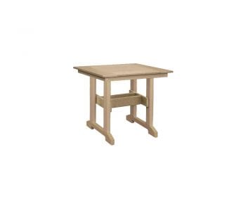 Great Bay square tan dining table.