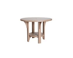 Light tan Great Bay round dining table.