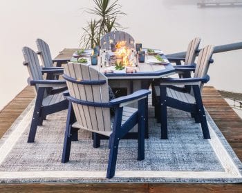 Blue and gray Summerside fire table set by the lake.