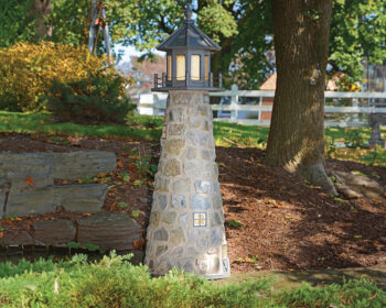 5 Ft Stone Lighthouse with Gray Top Lifestyle Image.