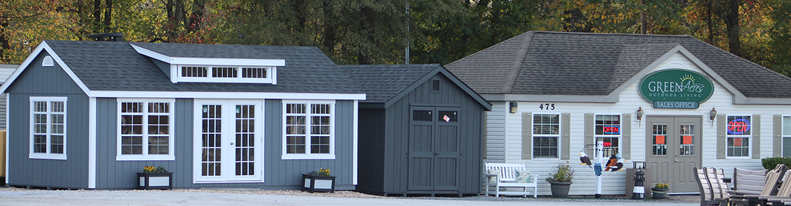 Marietta Store Front Location with two sheds on the left.